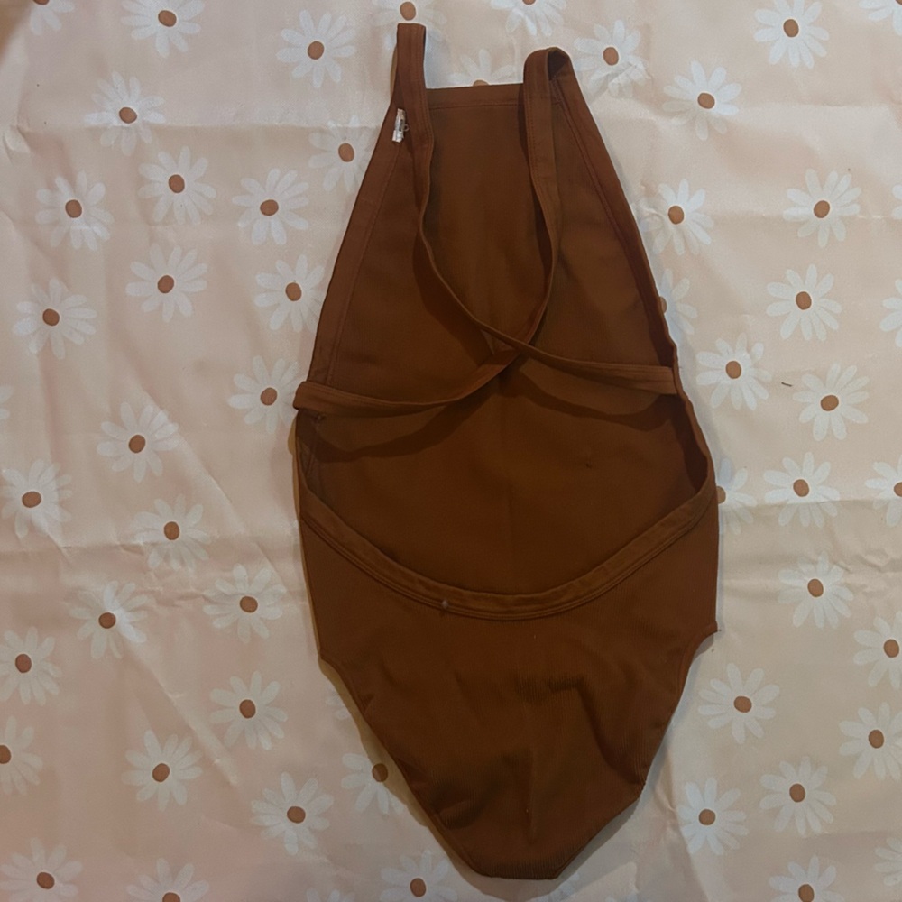 Orange halter body suit (this is the back)